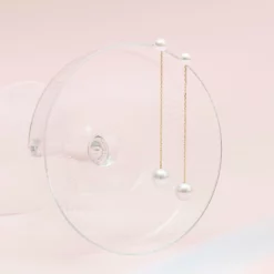 Everett Long Pearl Drop Earrings 7 Everett Long Pearl Drop Earrings -US Skirt Sales 2024 BIRDY GREY EVERETT LONG PEARL DROP EARRINGS GOLD 02