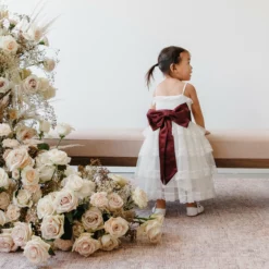 Liz Flower Girl Sash - Sheen Cabernet -US Skirt Sales 2024 ELIZABETHFLOWERGIRLSASH CABERNET