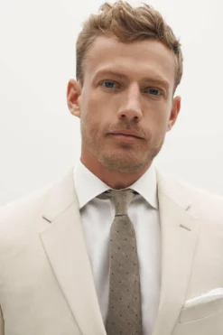 Tan Groomsman Suit By SuitShop -US Skirt Sales 2024 tan suitshop groomsmen suit jacket 02