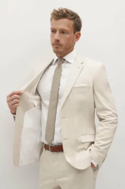 Tan Groomsman Suit By SuitShop -US Skirt Sales 2024 tan suitshop groomsmen suit jacket 06